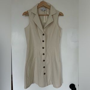 The Beige Lapel Button-up Sleeveless Mini Dress. Brand new with tags!